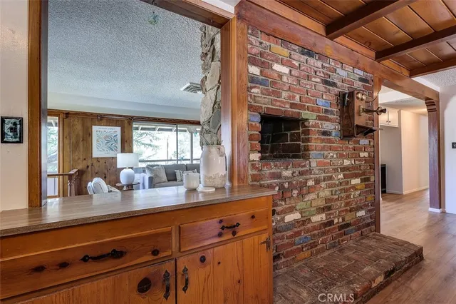 a kitchen with a sink and large window