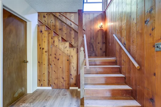 a view of entryway with wooden floor