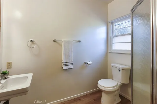 a room with a table and wooden floor