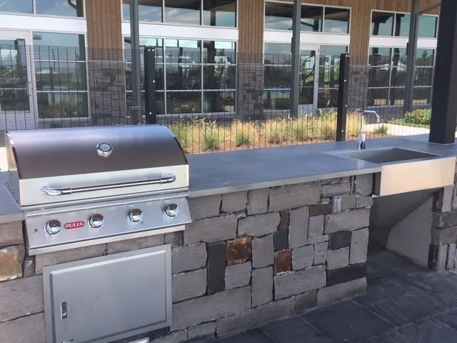 a view of a swimming pool with a yard