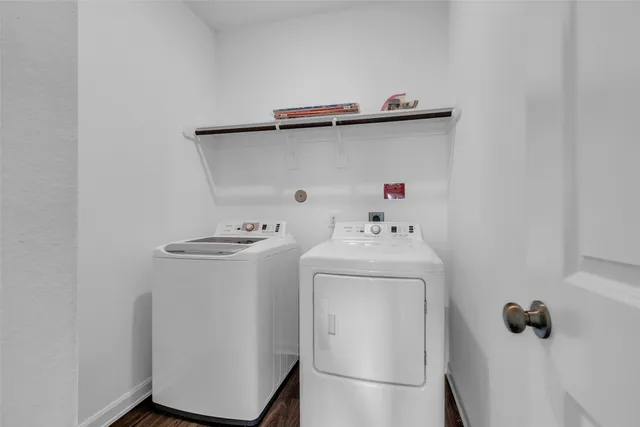 a utility room with dryer and washer