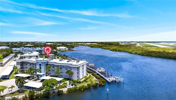 a view of a city with an ocean beach
