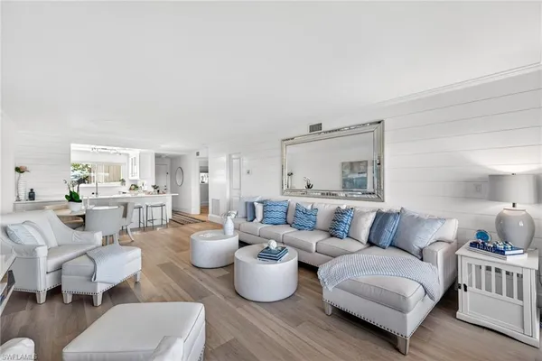 a living room with furniture and a view of living room