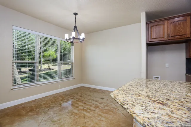 a view of a room with natural light