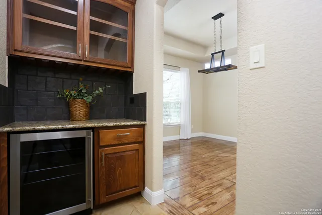 a kitchen with a stove and a sink
