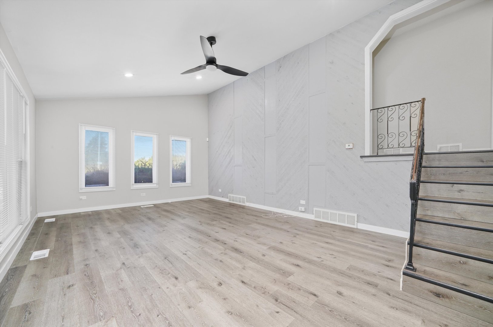1011 East 142nd Street Dolton, IL 60419 - Photo 15 of 21 a view of an empty room with wooden floor and a window