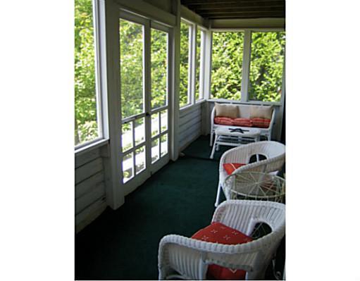 459 Ocean Point Road East Boothbay, ME 04544 - Photo 17 of 17 Patio/Deck. Green cottage porch