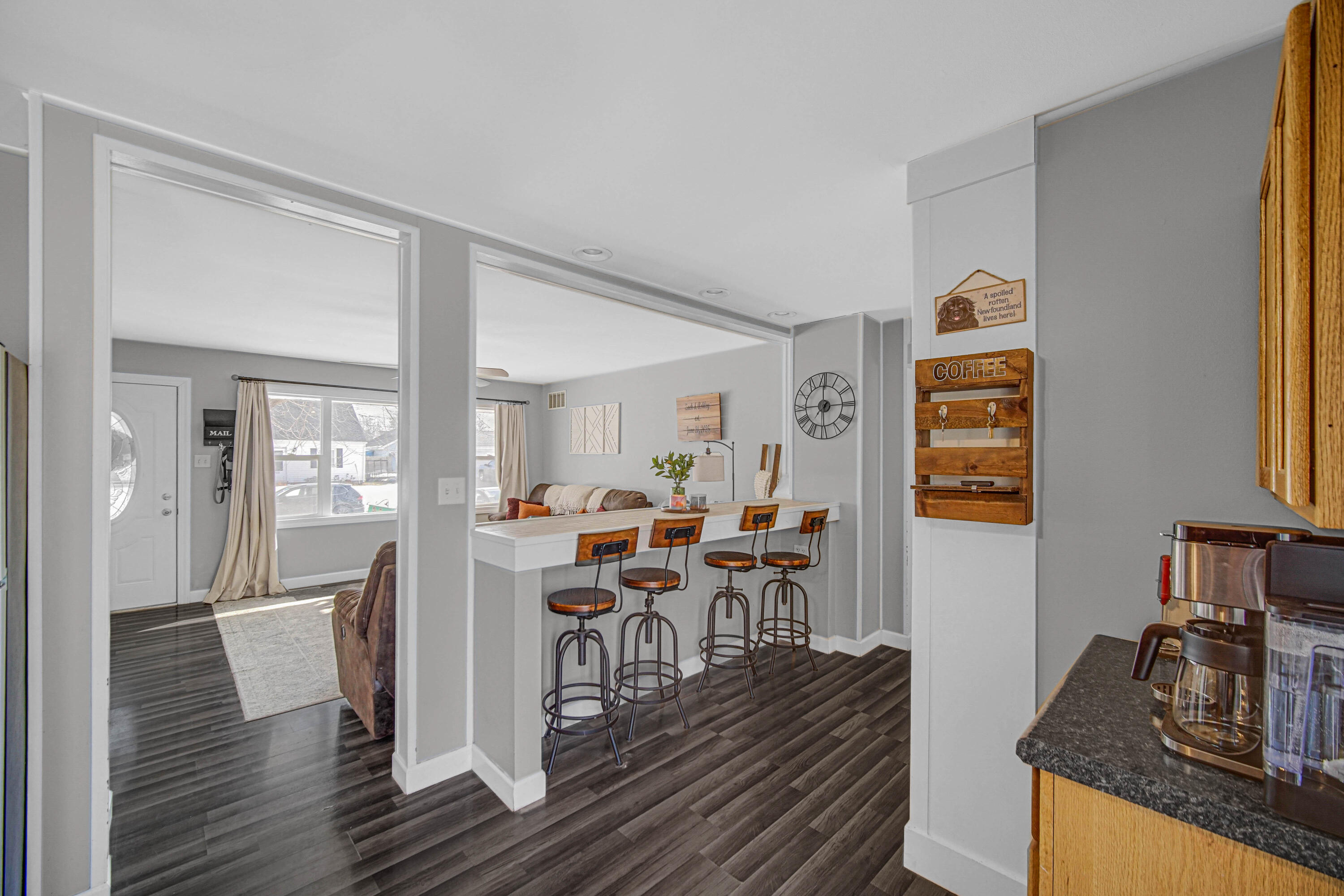 768 Devonshire Road Valparaiso, IN 46385 - Photo 15 of 23 a view of a dining room with furniture and wooden floor