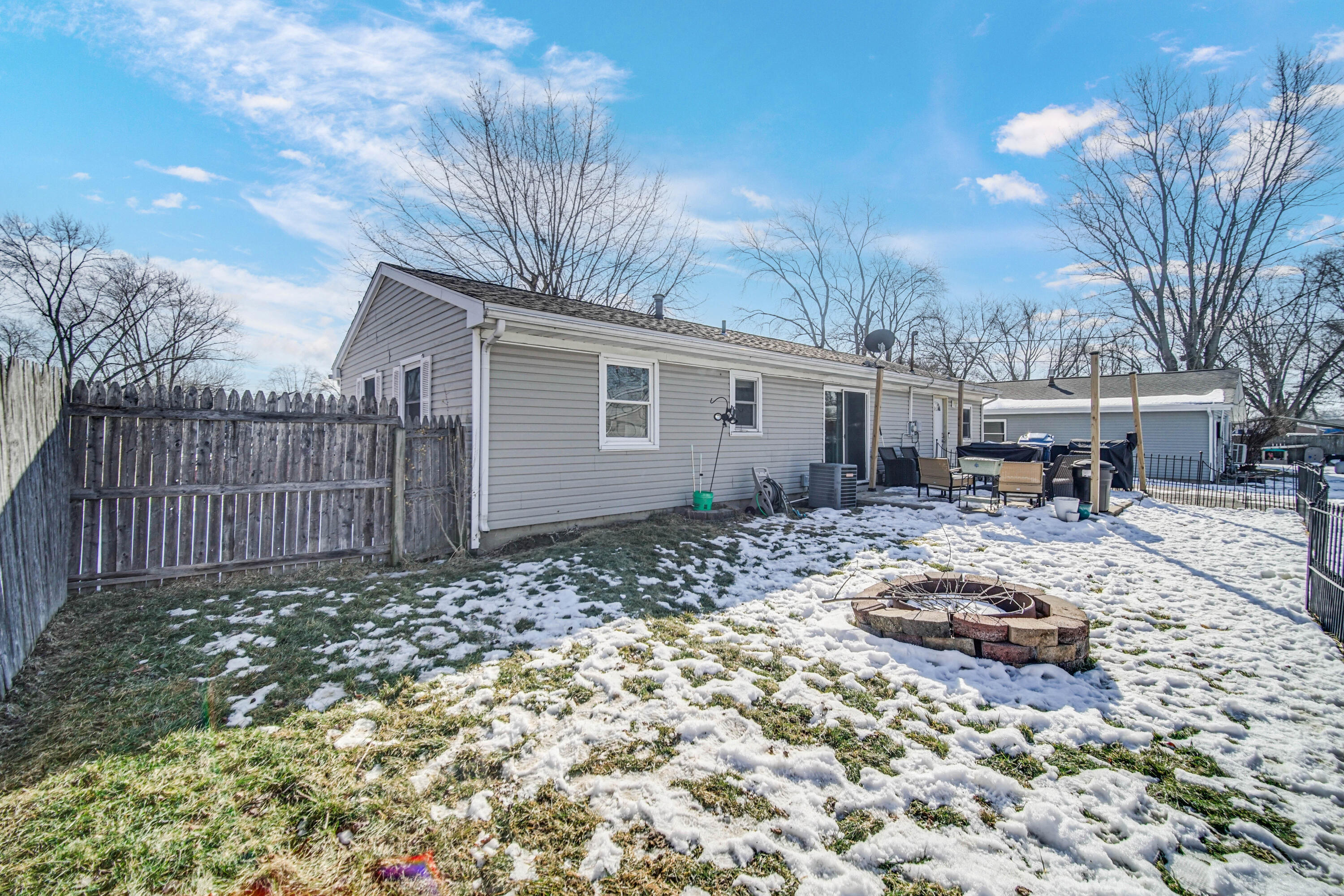 768 Devonshire Road Valparaiso, IN 46385 - Photo 16 of 23 a view of a backyard with sitting area