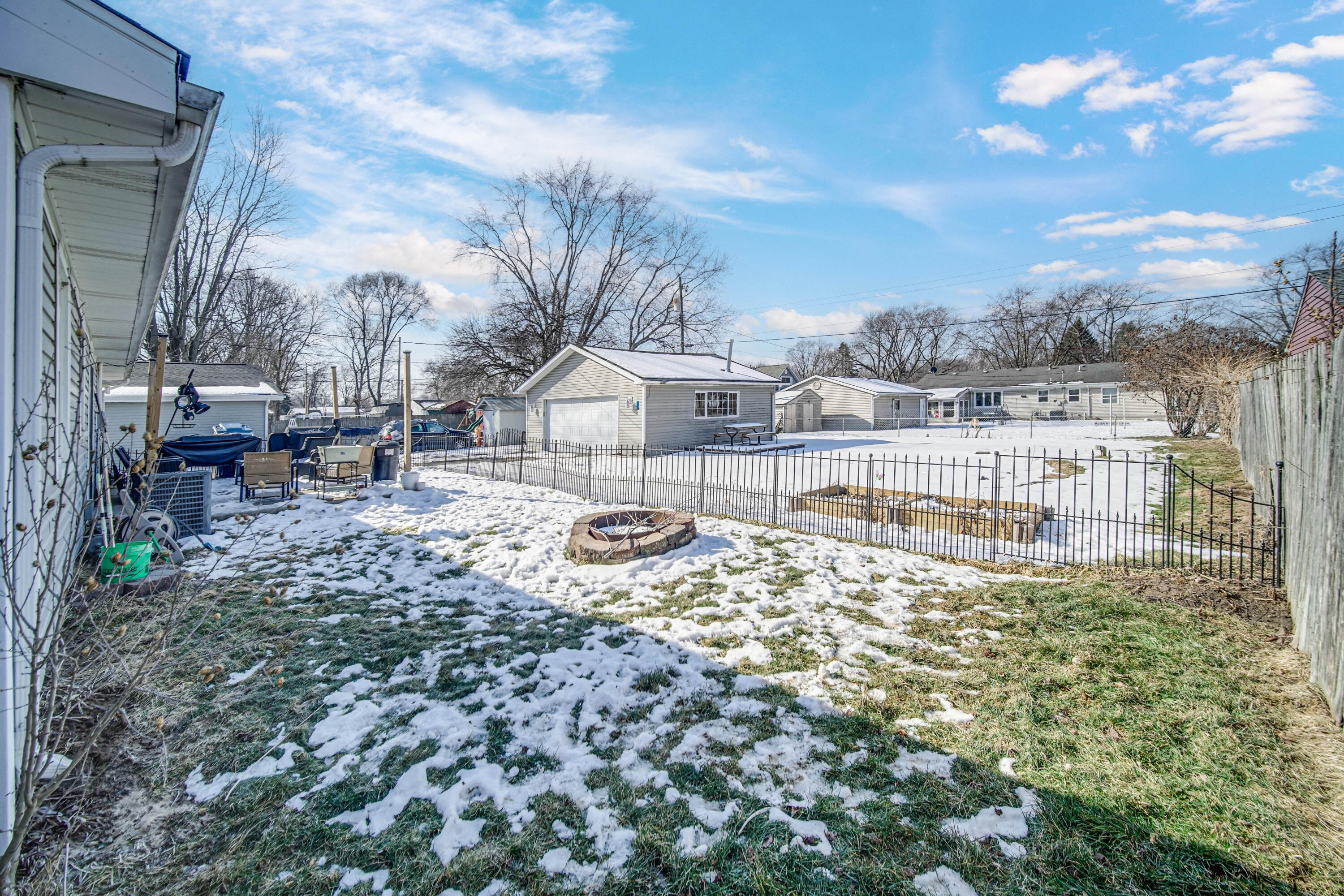 768 Devonshire Road Valparaiso, IN 46385 - Photo 17 of 23 a view of house with yard and sitting area