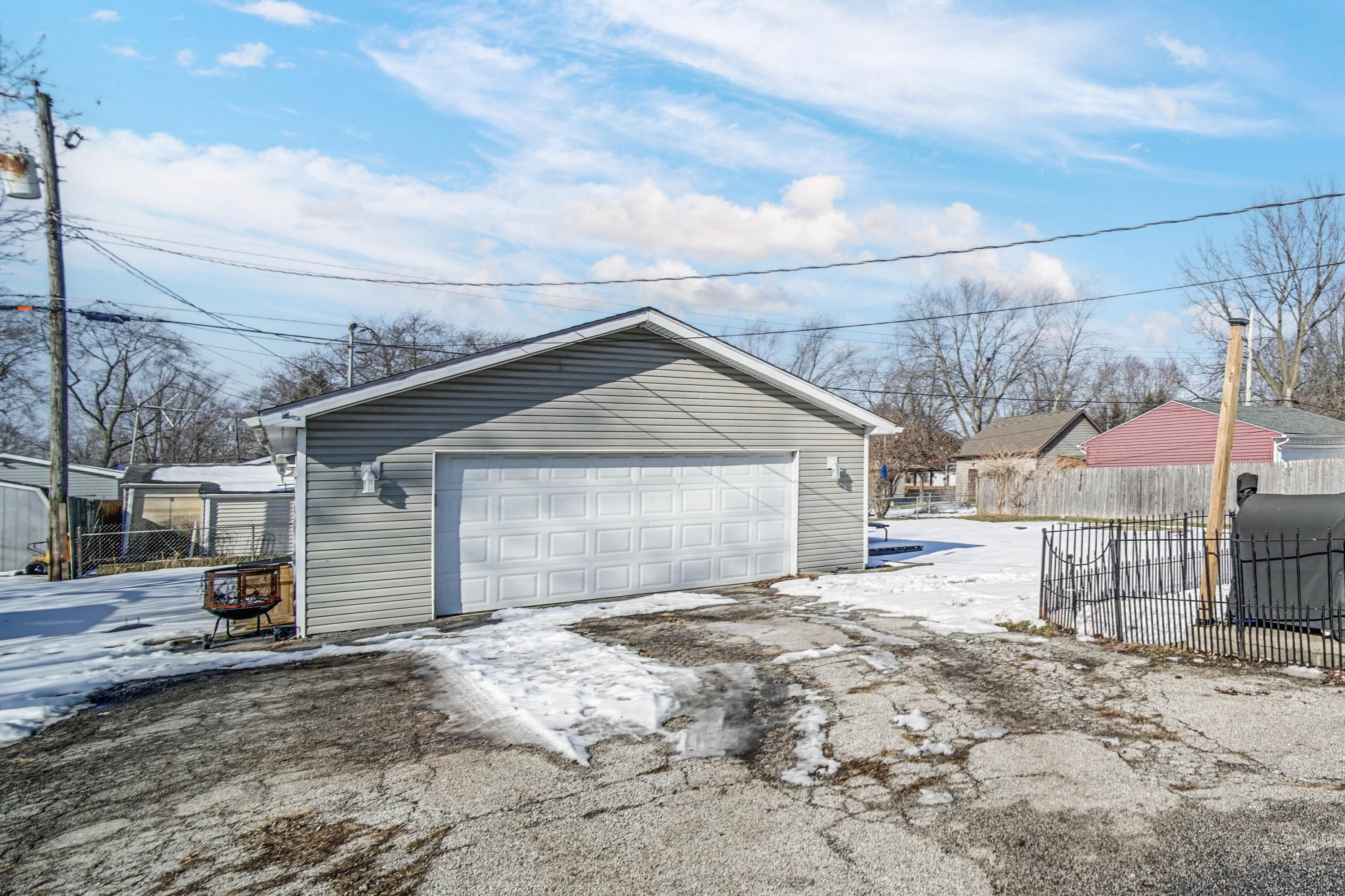 768 Devonshire Road Valparaiso, IN 46385 - Photo 18 of 23 a view of a house with a yard