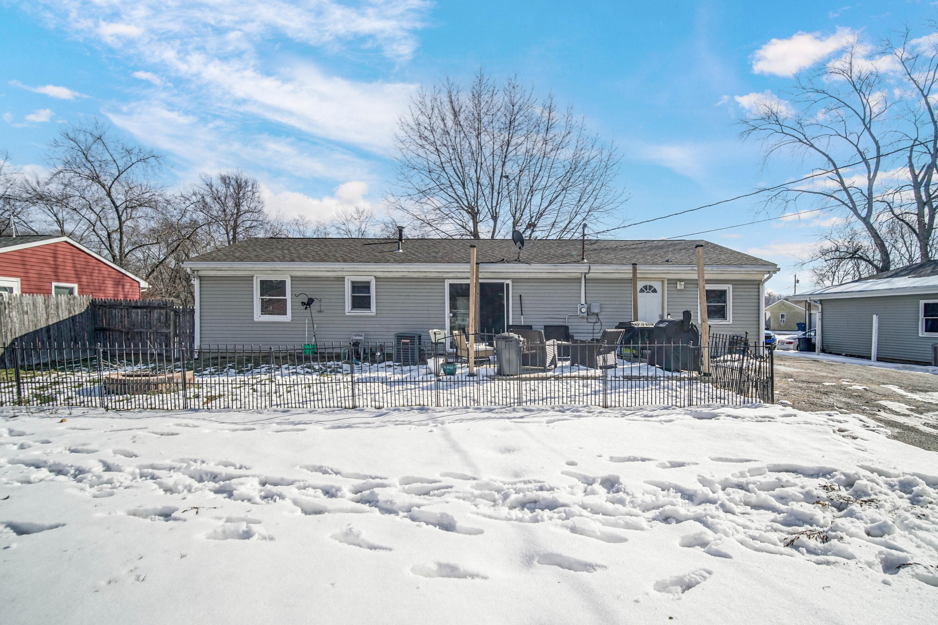 768 Devonshire Road Valparaiso, IN 46385 - Photo 20 of 23 a view of a house with snow on the side of the road