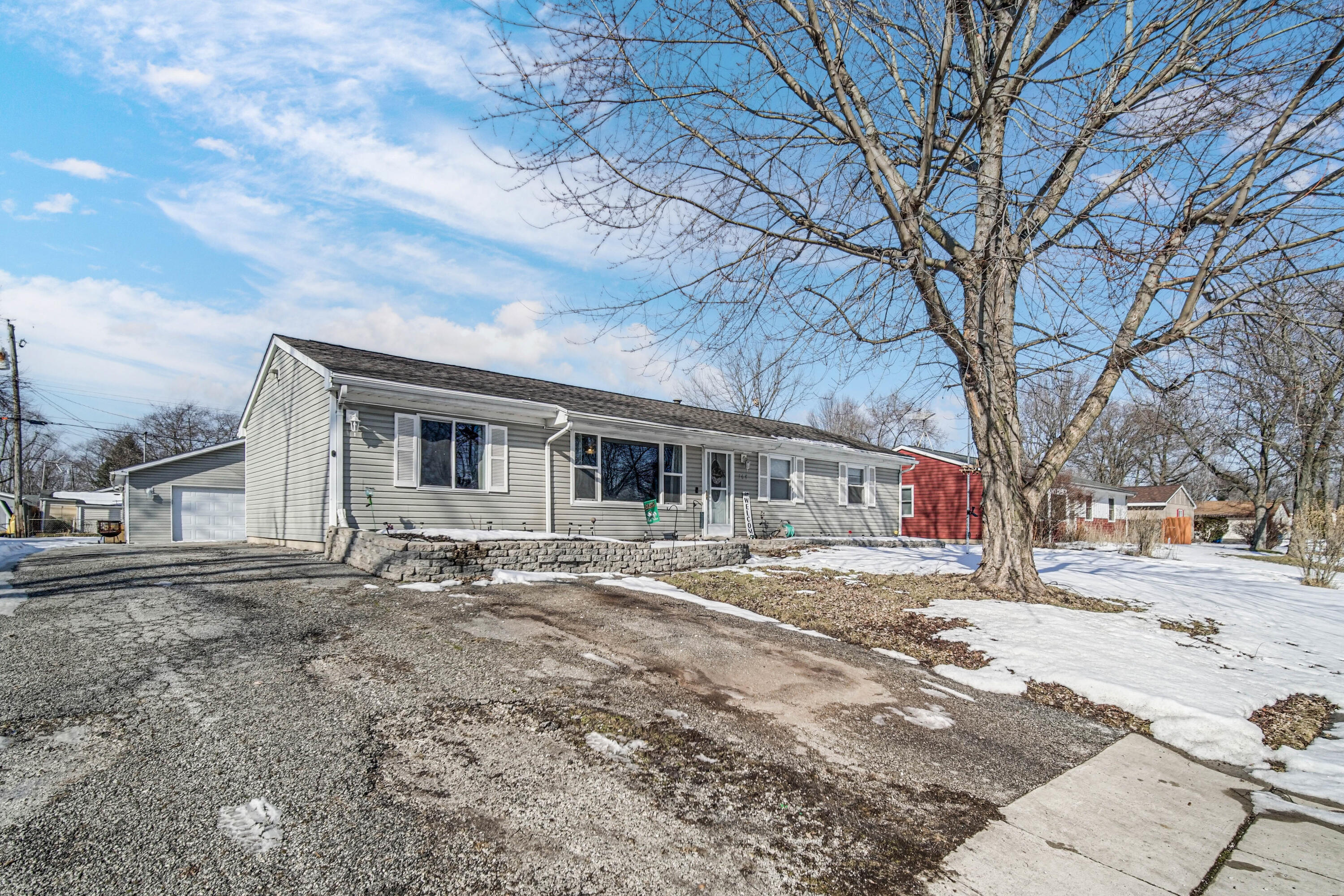 768 Devonshire Road Valparaiso, IN 46385 - Photo 2 of 23 a front view of a house with a yard