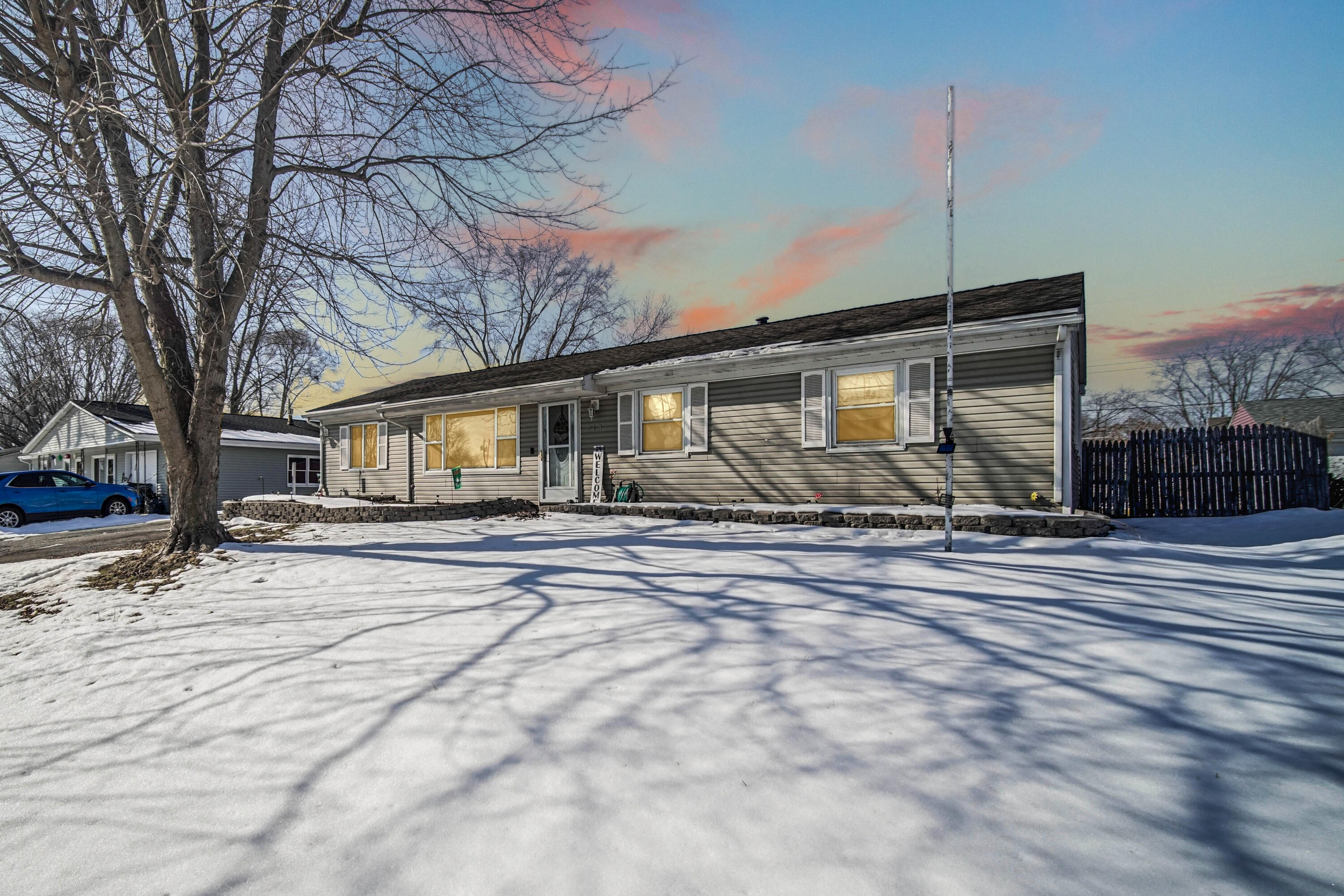 768 Devonshire Road Valparaiso, IN 46385 - Photo 23 of 23 a front view of a house with a yard and garage
