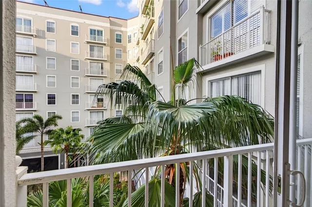 a view of a building and a yard