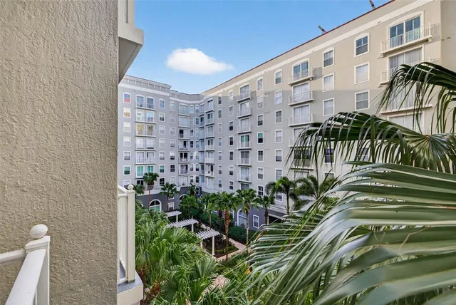 a view of a tall building with many windows
