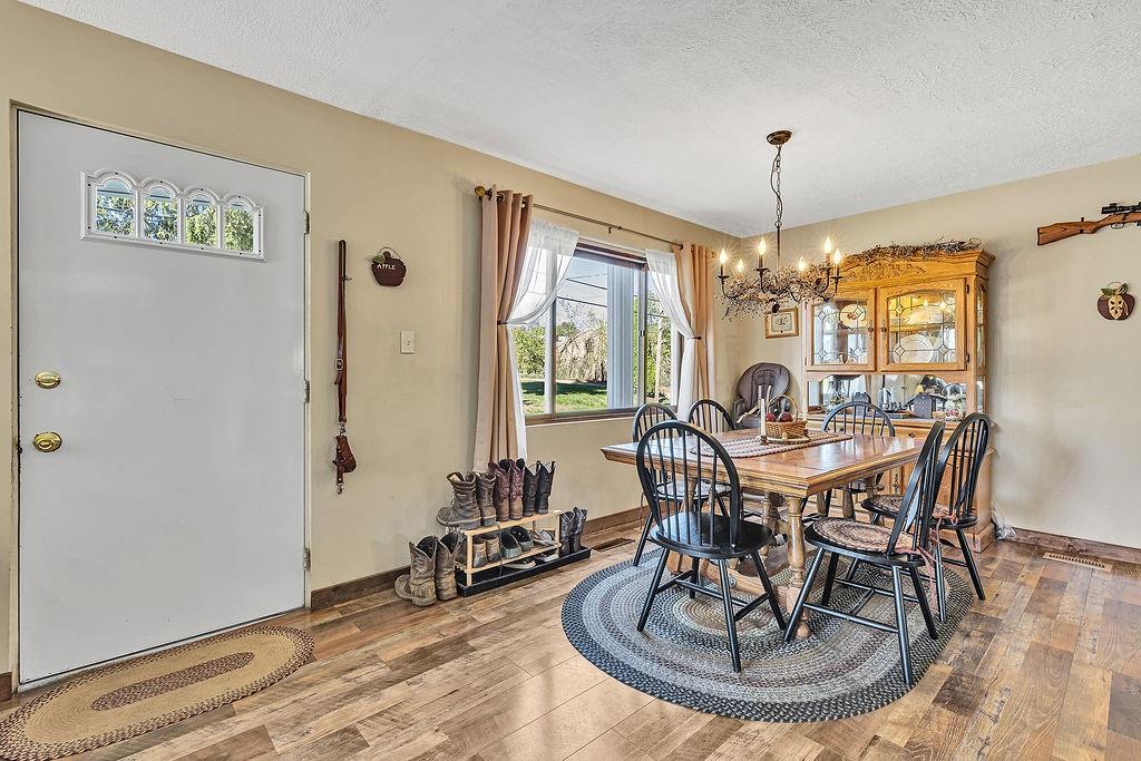 6437 Tuscarawas Road Midland, PA 15059 - Photo 10 of 29 a view of a dining room with furniture window and outside view