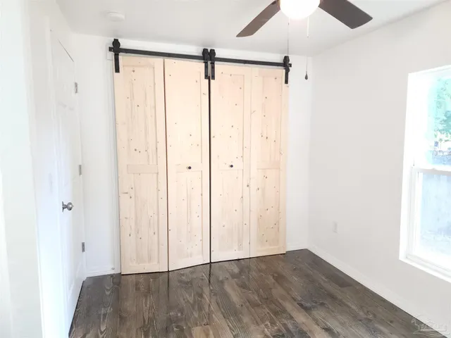 a view of walk in closet with window