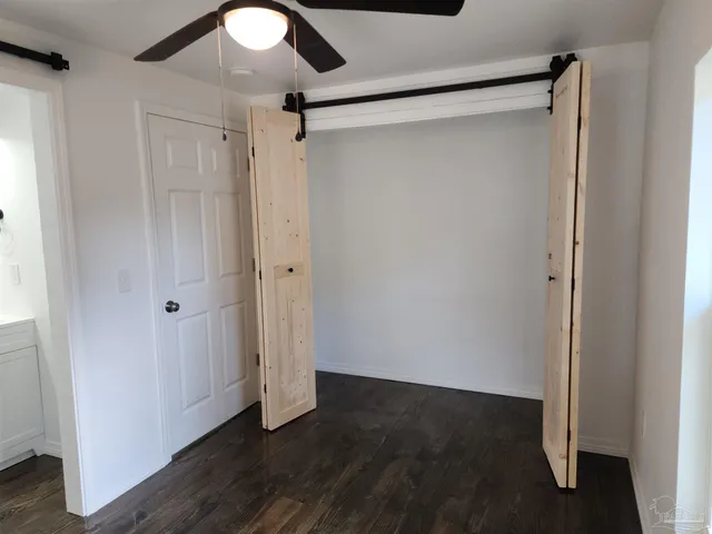 a view of entryway with wooden floor