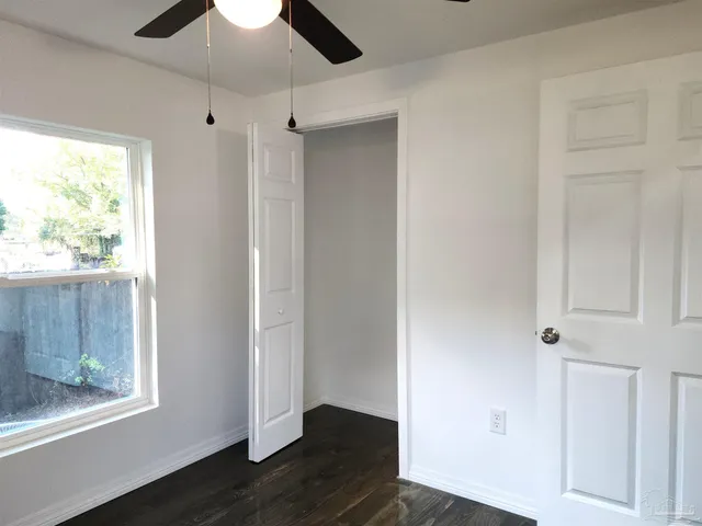 a view of entryway with wooden floor
