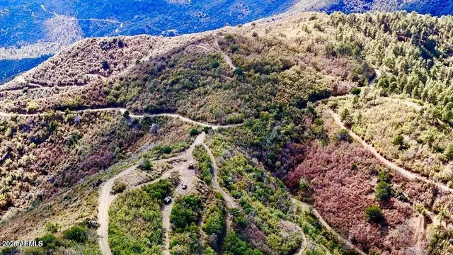 a view of mountains and valleys