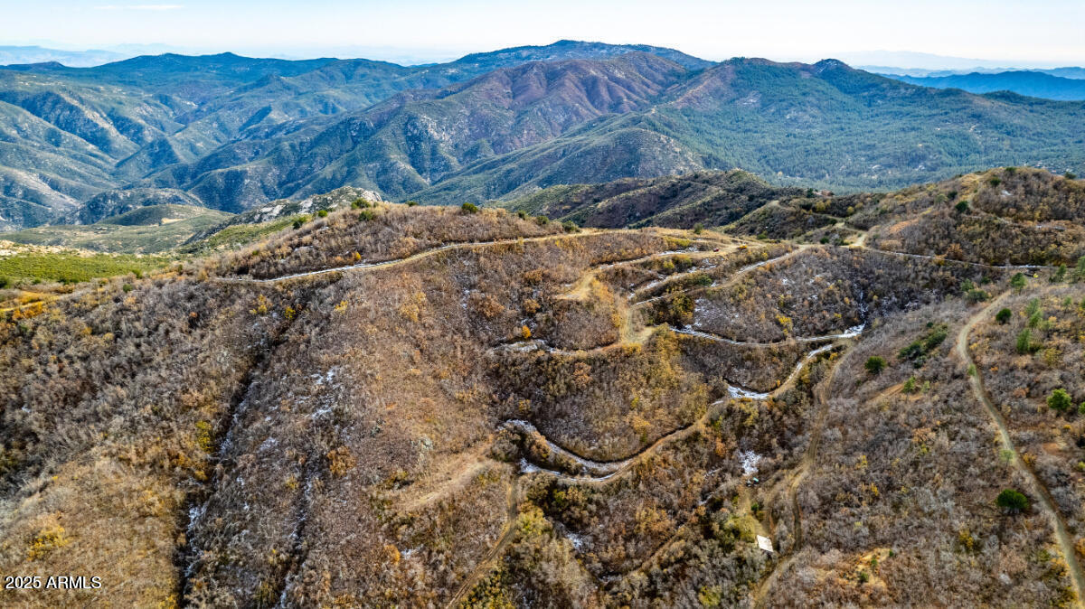 0 East Lincoln Ridge Road Crown King, AZ 86343 - Photo 21 of 25 a view of a backyard with wooden fence