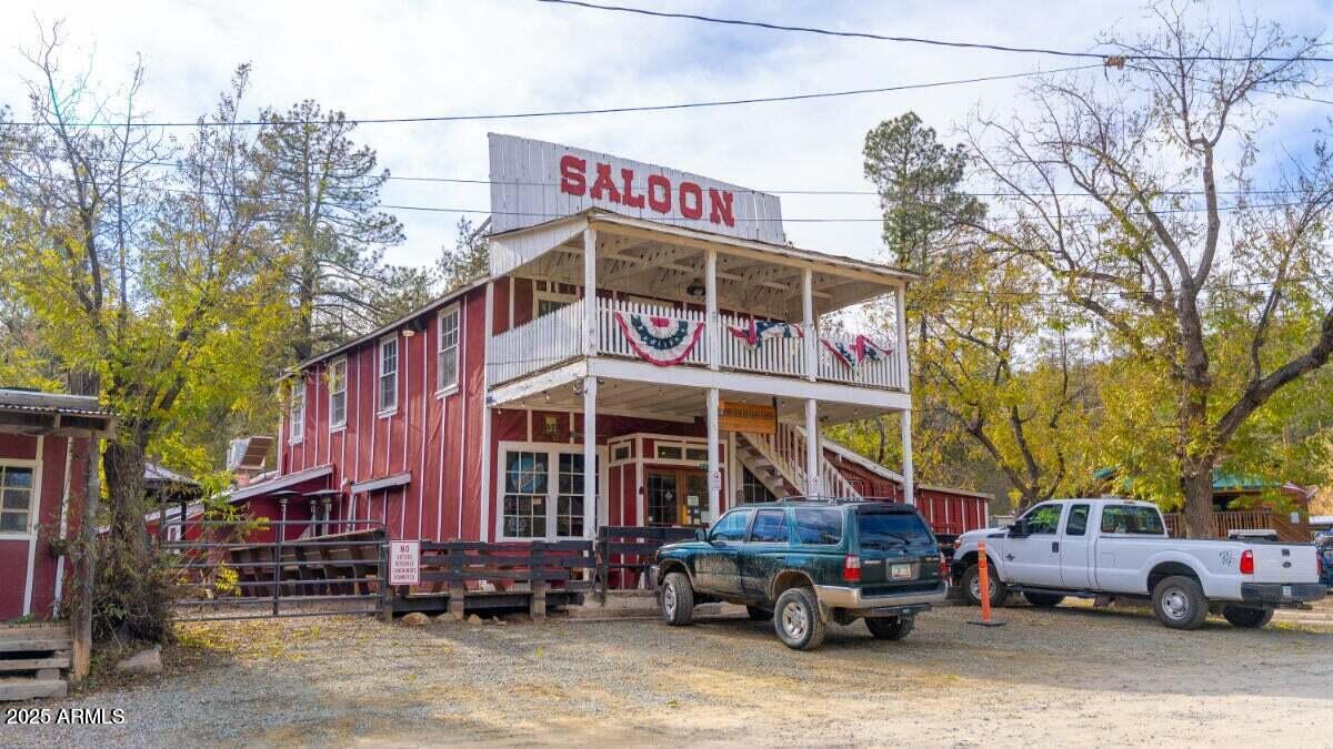 0 East Lincoln Ridge Road Crown King, AZ 86343 - Photo 23 of 25 a car parked in front of a building