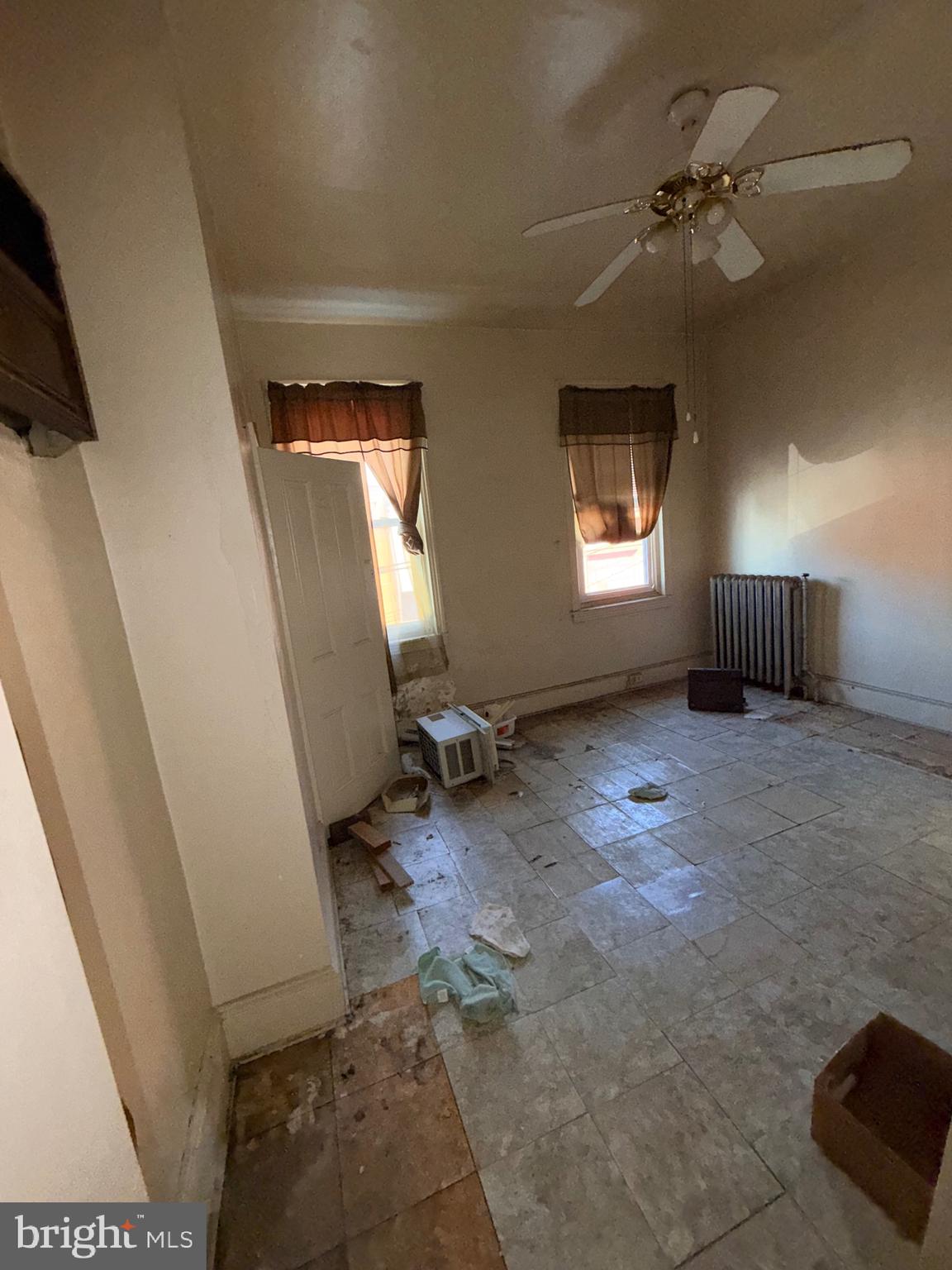 2740 West Cabot Street Philadelphia, PA 19121 - Photo 6 of 7 a view of a livingroom with a fireplace