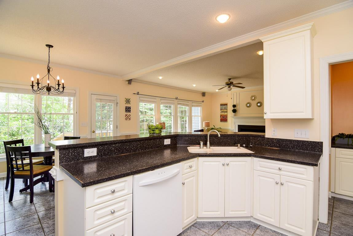 8808 Salute Street Raleigh, NC 27615 - Photo 6 of 25 Open kitchen with 42 inch cabinets, while washing dishes you can look out the open window. Kitchen