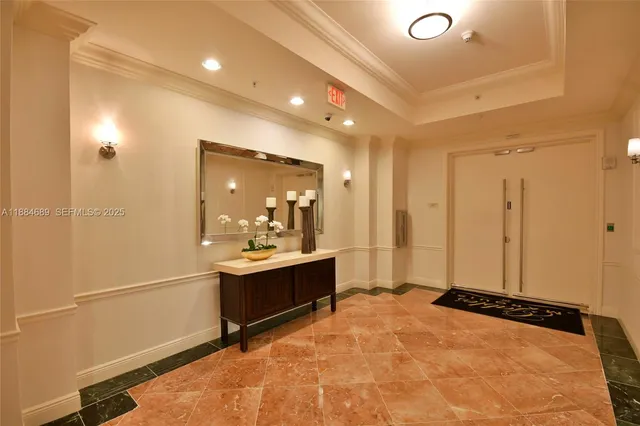 a view of a bathroom with a tub and shower