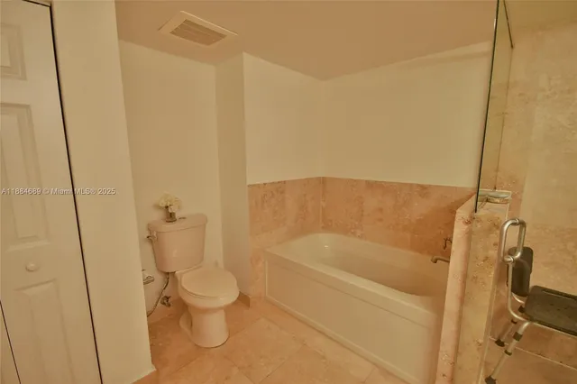 a living room with furniture or window and a flat screen tv