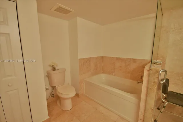 a living room with furniture or window and a flat screen tv