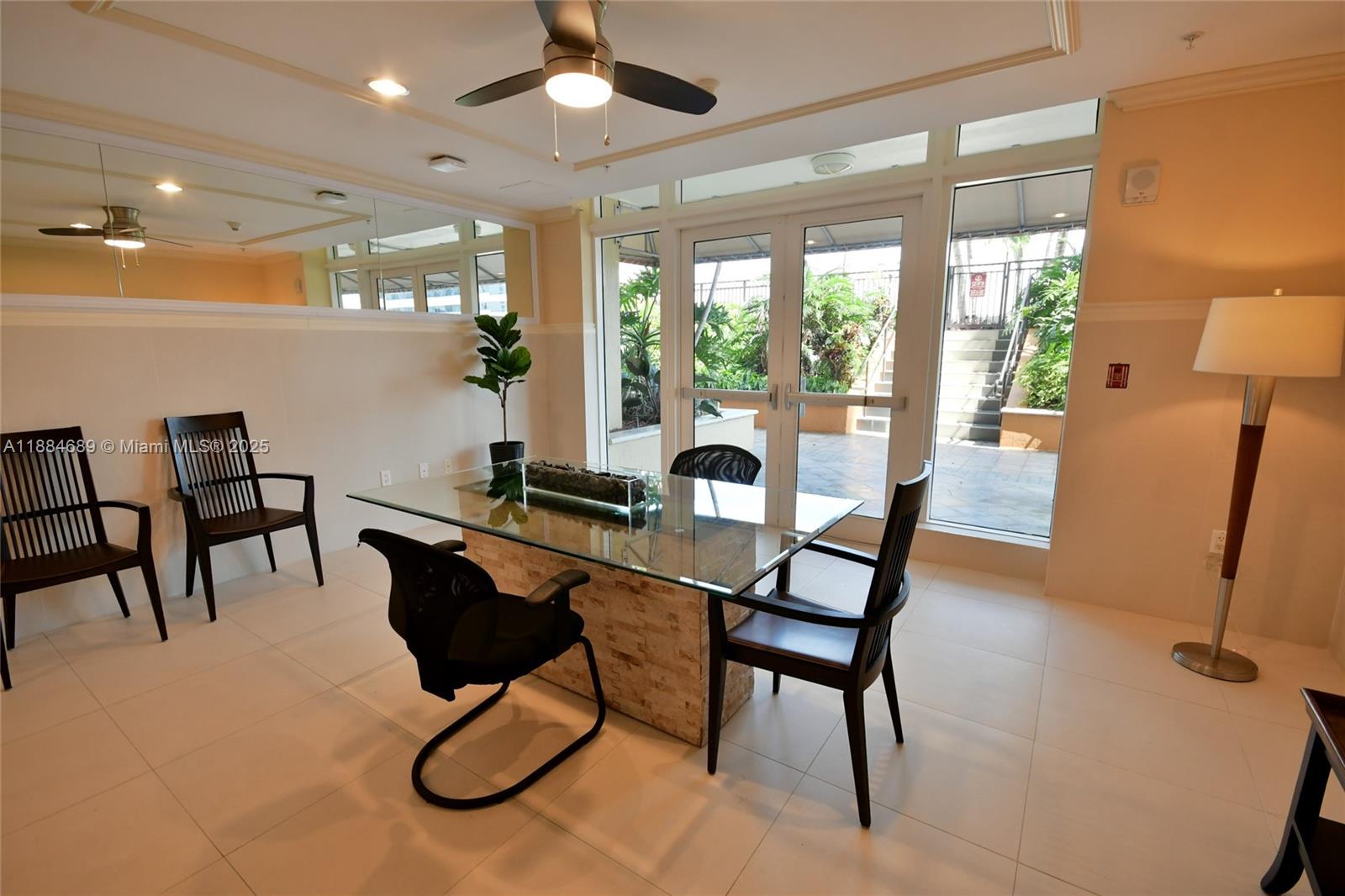 3232 Southwest 22nd Terrace, Unit 1502 Miami, FL 33145 - Photo 43 of 45 a view of a dining room with furniture window and outside view