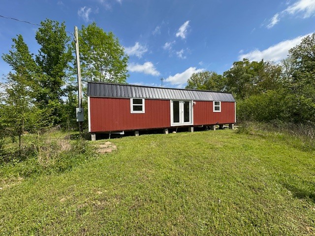 0 Stones Road Camden, TN 38320 - Photo 11 of 28 a backyard of a house with lots of green space