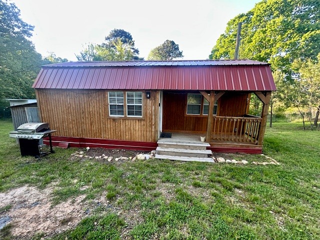 0 Stones Road Camden, TN 38320 - Photo 13 of 28 a view of a chair and table in the garden