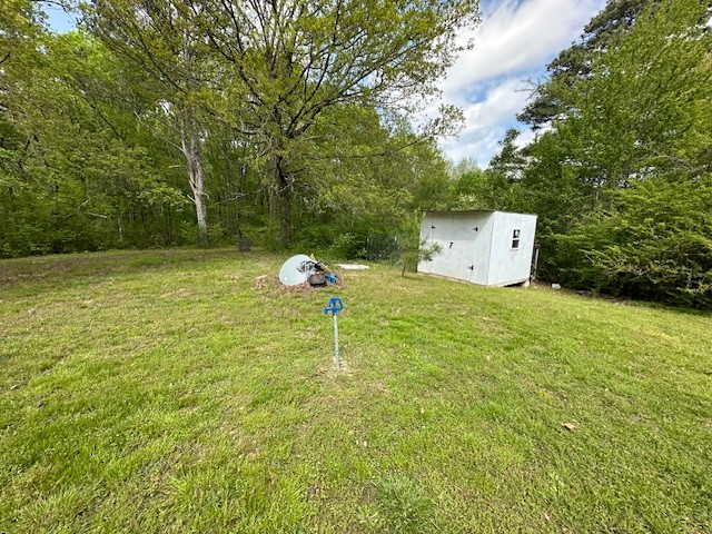 0 Stones Road Camden, TN 38320 - Photo 18 of 28 a backyard of a house with lots of green space