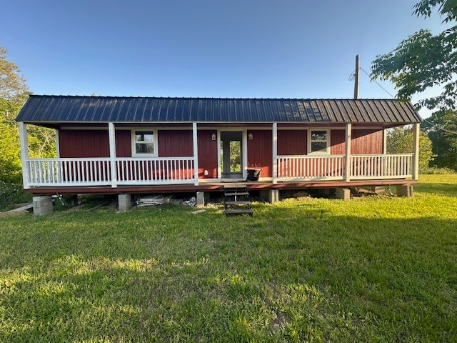 0 Stones Road Camden, TN 38320 - Photo 10 of 28 a view of a house with a yard and deck