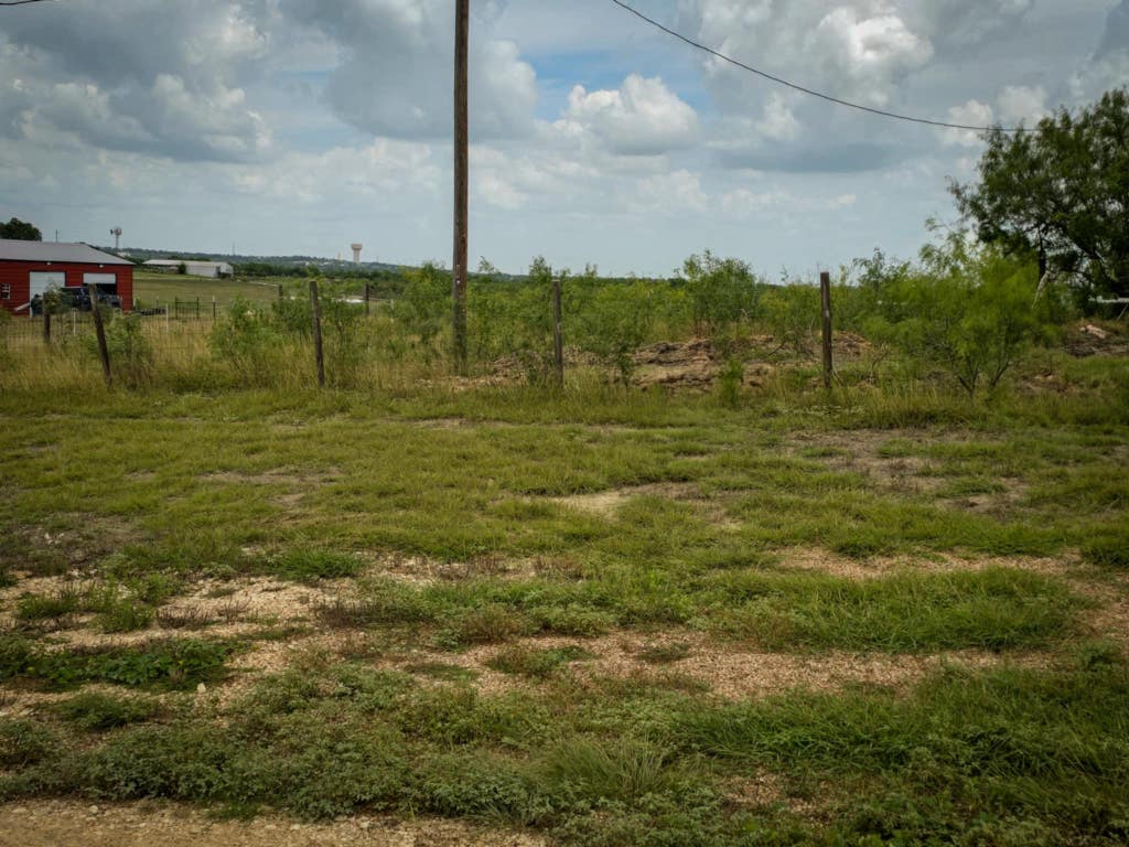 414 3 G Ranch Road Kyle, TX 78640 - Photo 1 of 4 a view of a lake view