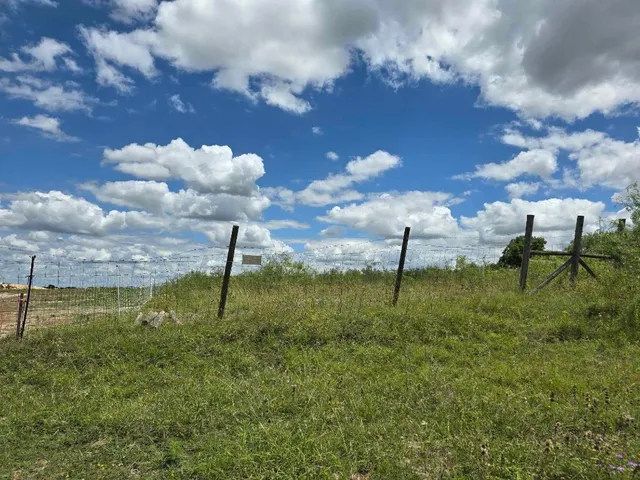 a view of a golf course with a fountain