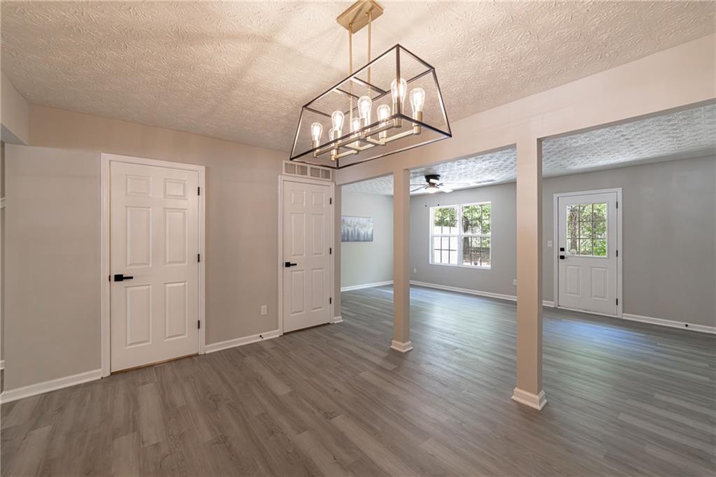3017 Waldrop Circle Decatur, GA 30034 - Photo 14 of 52 a view of an empty room with wooden floor and a window