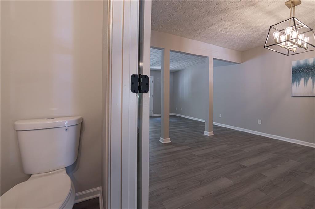 3017 Waldrop Circle Decatur, GA 30034 - Photo 19 of 52 a bathroom with a toilet and a mirror