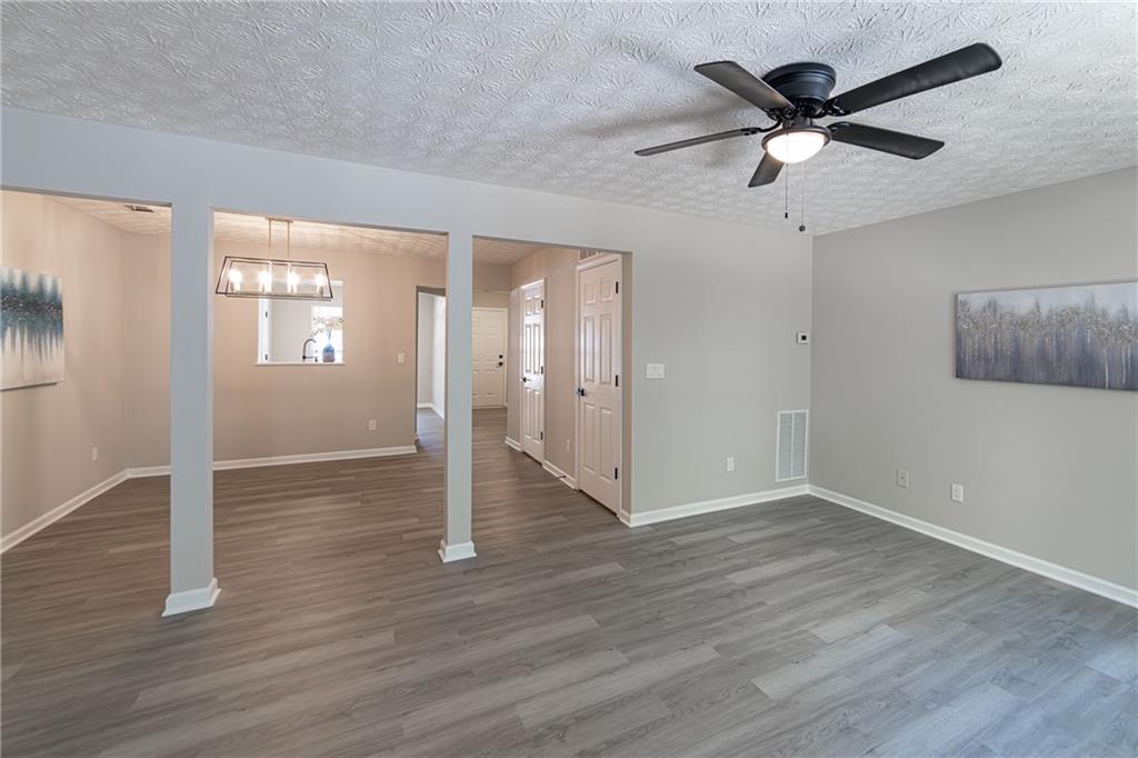 3017 Waldrop Circle Decatur, GA 30034 - Photo 27 of 52 wooden floor in an empty room with a window