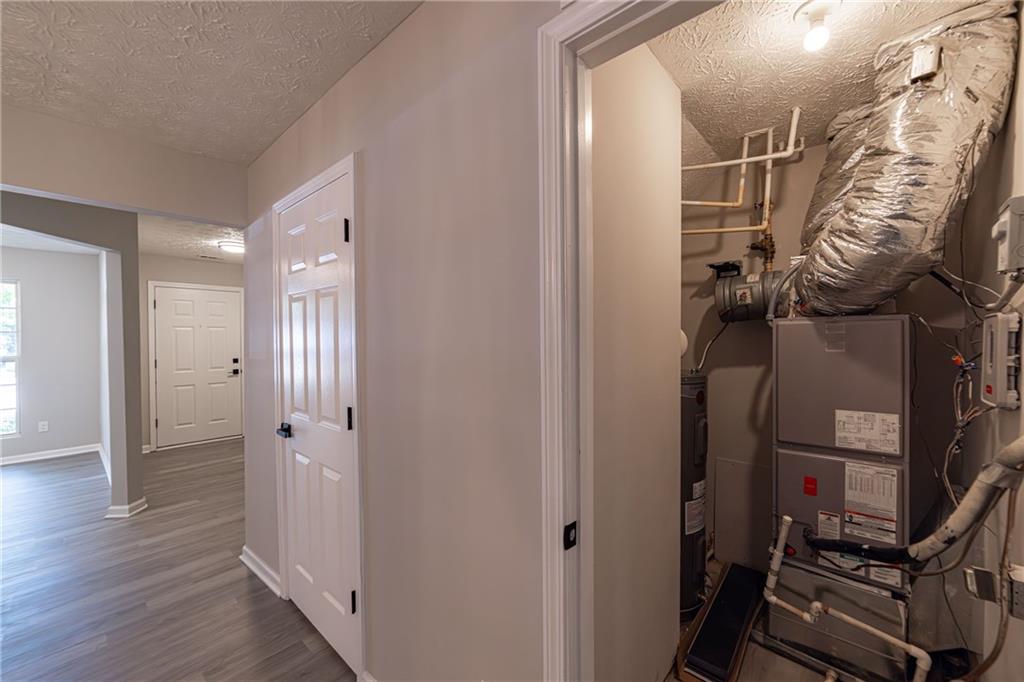 3017 Waldrop Circle Decatur, GA 30034 - Photo 28 of 52 a view of a hallway with wooden floor and entryway