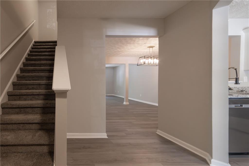 3017 Waldrop Circle Decatur, GA 30034 - Photo 4 of 52 a view of hallway with stairs and wooden floor
