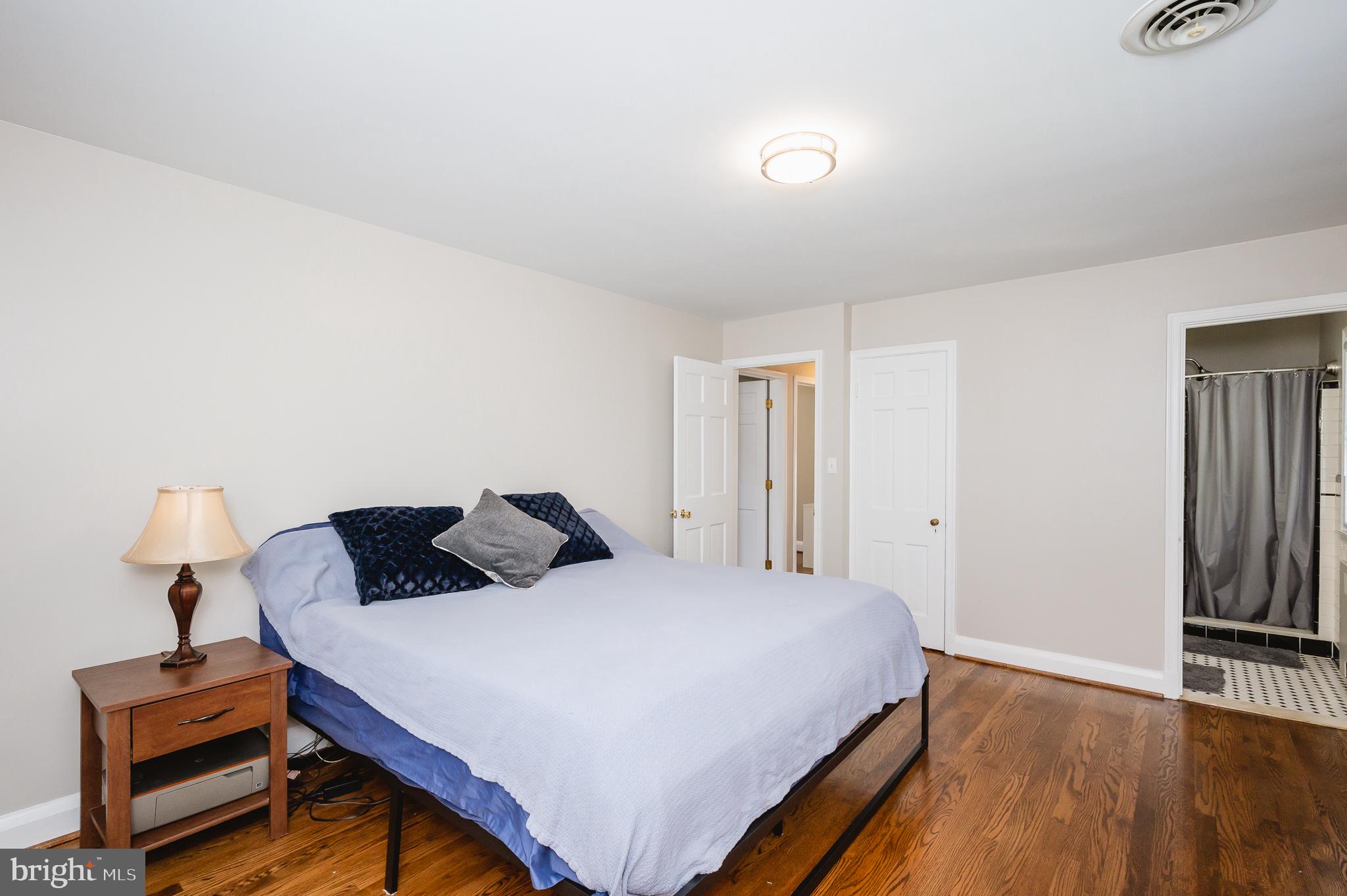 7025 Kenleigh Road Baltimore, MD 21212 - Photo 22 of 53 Primary bedroom. Refinished hardwood flooring.