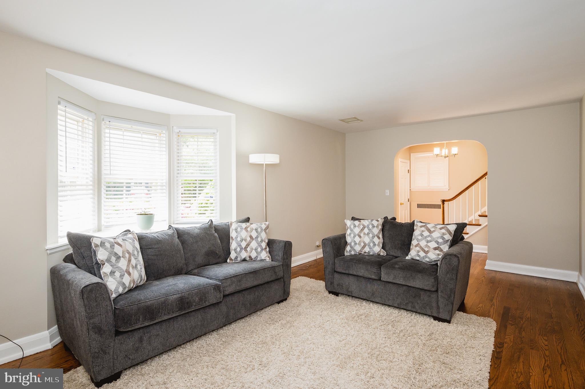 7025 Kenleigh Road Baltimore, MD 21212 - Photo 7 of 53 Sun filled living room with bay window.