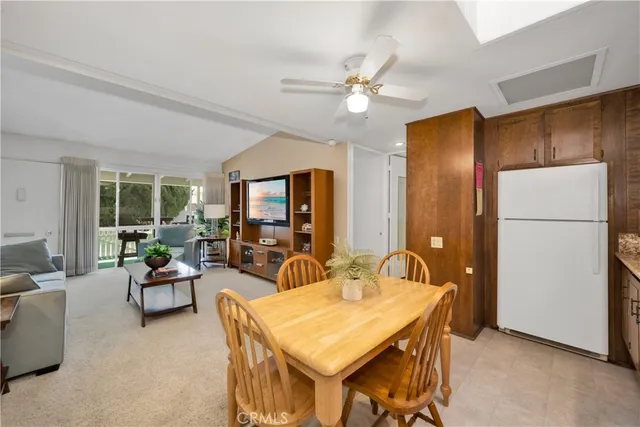 a view of a livingroom with furniture and window