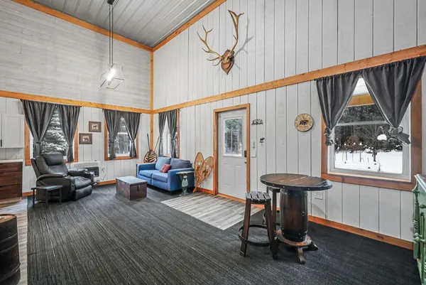 $330,000 | 8074 Grosbeak Drive Northwest, Alden, MI 49612