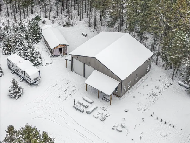 $330,000 | 8074 Grosbeak Drive Northwest, Alden, MI 49612