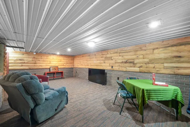 $330,000 | 8074 Grosbeak Drive Northwest, Alden, MI 49612